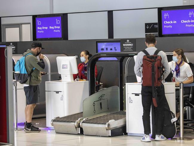 Virgin Terminal at Melbourne Airport where two overseas passengers flew in from Sydney yesterday after not being tested or quarantined in Sydney upon their arrival.Passengers check in their baggage. Picture : Ian Currie