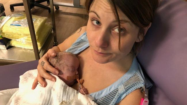 Krista Jarvis with her young bub Malakai. The two are still in hospital. Ms Jarvis' home was destroyed by fire at the weekend.