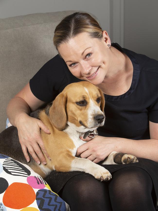 Mount Barker resident Michelle Buckley holding a very exhausted Lexi, her 6-year-old Beagle, who returned home on her own. Picture: Emma Brasier