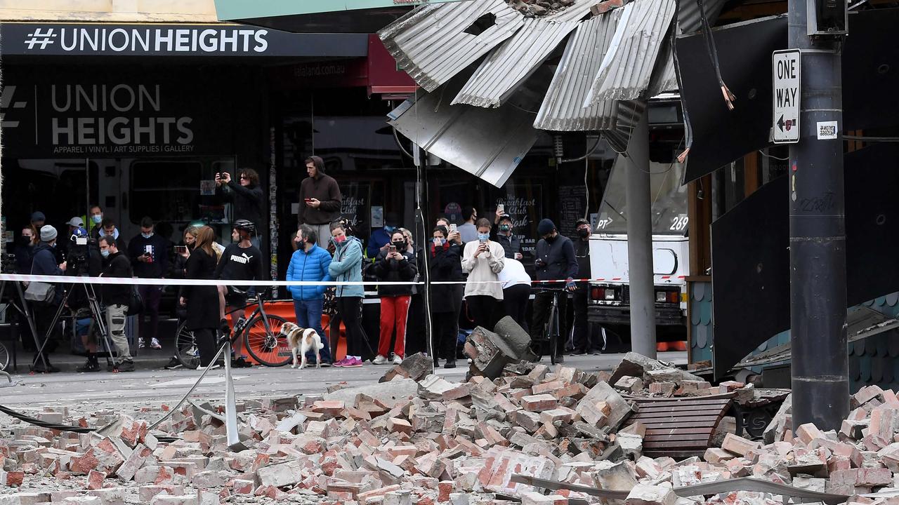 Locals view the damage. Picture: William West