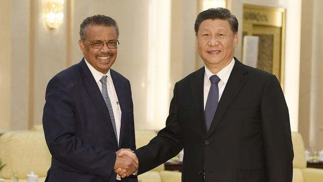 WHO director-general Tedros Adhanom shakes hands with Xi Jinping before a meeting in Beijing in January. Picture: AFP