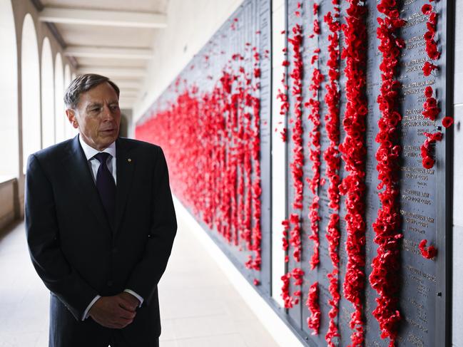 United States General (Retd) David H. Petraeus is seen as he inspects the Roll of Honour during a visit to the Australian War Memorial in Canberra, Tuesday, August 13, 2019. (AAP Image/Lukas Coch) NO ARCHIVING