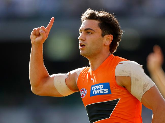 MELBOURNE, AUSTRALIA - MARCH 27: Tim Taranto of the Giants celebrates a goal during the 2022 AFL Round 02 match between the Richmond Tigers and the GWS Giants at the Melbourne Cricket Ground on March 27, 2022 In Melbourne, Australia. (Photo by Dylan BurnsAFL Photos)