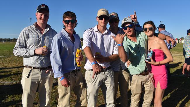 Spectators cheer on as they watch the B Grade St George vs Condamine match at the Roma Rugby Races at Bassett Park. Picture: Chloe Cufflin.