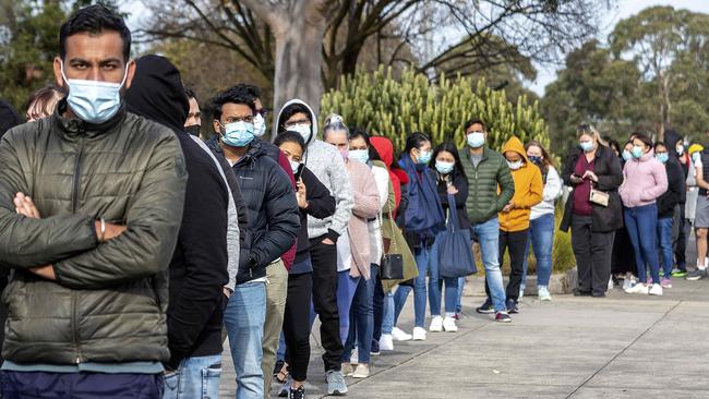 People queue for Covid vaccination at Sandown Racecourse. Picture: NCA NewsWire / David Geraghty