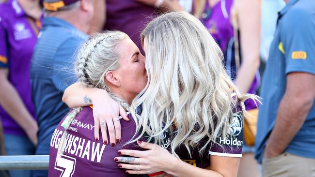 Broncos captain Ali Brigginshaw kisses partner Kate Daly after winning the 2018 NRL Women's Premiership Grand Final match. Picture: Cameron Spencer/Getty Images