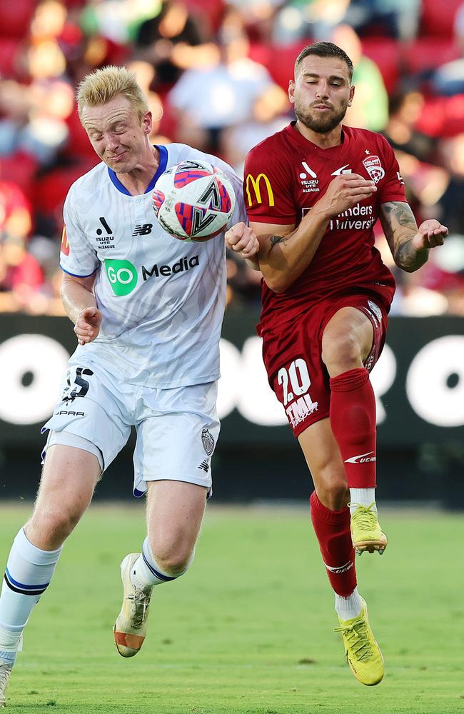 Auckland’s Francis De Vries and Adelaide United’s Dylan Pierias compete for the ball. Picture: Getty Images