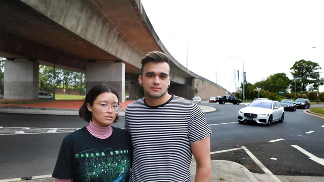 Celeste Dao and Andrew Aviet standing in front of the Polding St roundabout. Picture: AAP IMAGE/ Angelo Velardo