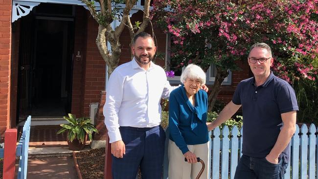 Elizabeth Ahlston with agent Adrian Tsavalas (left) and John McGrath.