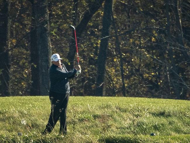 Donald Trump played golf at Trump National Golf Club after Joe Biden was declared the winner of the US election. He is yet to concede defeat. Picture: AFP