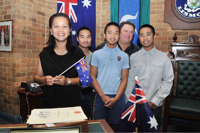 FLAG DAY: Sheila Galea who became an Australian citizen, Nicolas Galea, Paolo Galea, Greg Galea (Sheila’s husband) and Franco Galea, at the citizenship ceremony. Picture: Mireille Merlet-Shaw