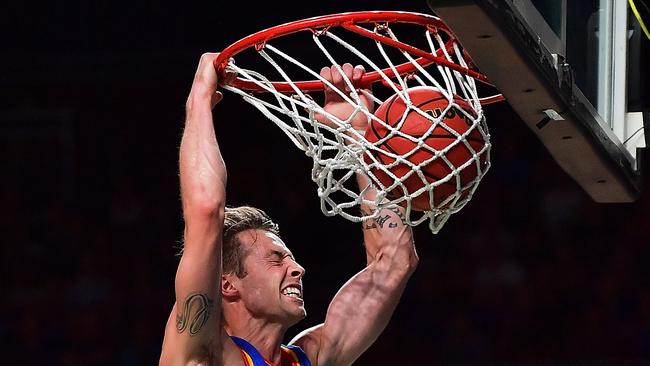 Bam! Nathan Sobey dunks against Melbourne United. Picture: Daniel Kalisz (Getty Images)