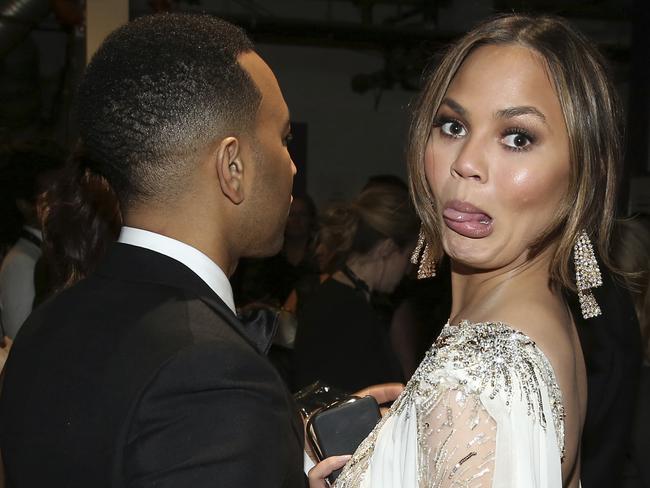 Chrissy Teigen backstage at the Oscars with her husband, John Legend. Picture: Matt Sayles/Invision/AP