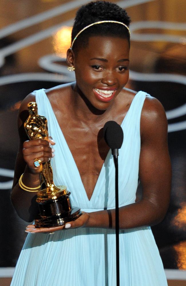 Lupita Nyong'o accepts the Oscar for Best Supporting Actress for 12 Years a Slave in 2014. Picture: Kevin Winter/Getty Images