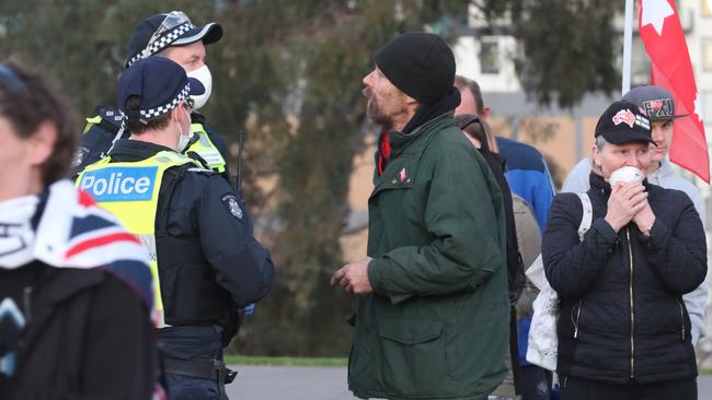 A protester talks with police. Picture: David Crosling / NCA NewsWire