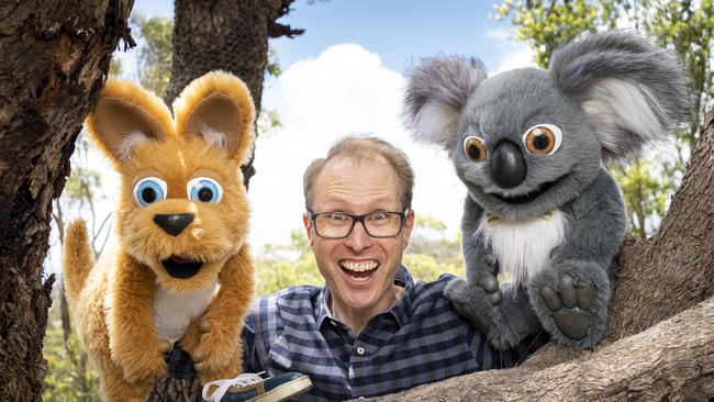 Luke Spencer Tregloan, prior to his arrest, with two of the puppets that starred in the education app he co-created. Picture: AAP/Mike Burton.