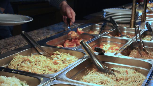 Children at one school are told to leave class early to go and help serve food to their peers.