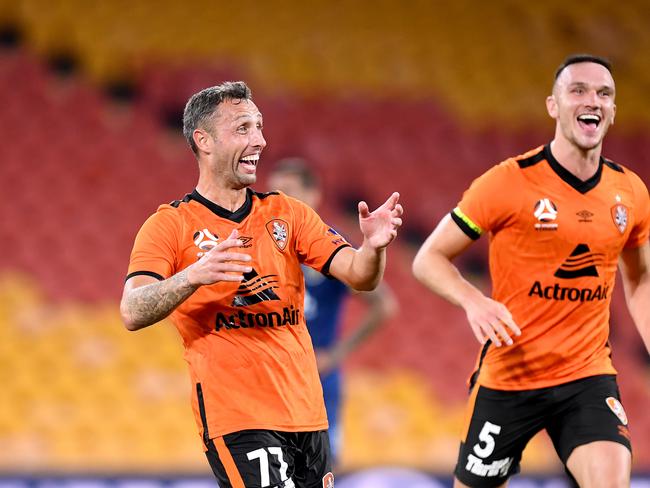 BRISBANE, AUSTRALIA - MARCH 13: Scott McDonald of the Roar celebrates scoring a goal during the round 23 A-League match between the Brisbane Roar and the Central Coast Mariners at Suncorp Stadium on March 13, 2020 in Brisbane, Australia. (Photo by Bradley Kanaris/Getty Images)