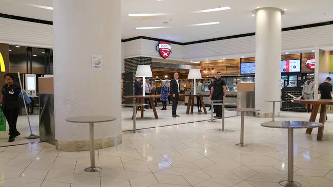 Chairs are removed from a food court outside Crown Casino. Picture: AAP Image/Scott Barbour