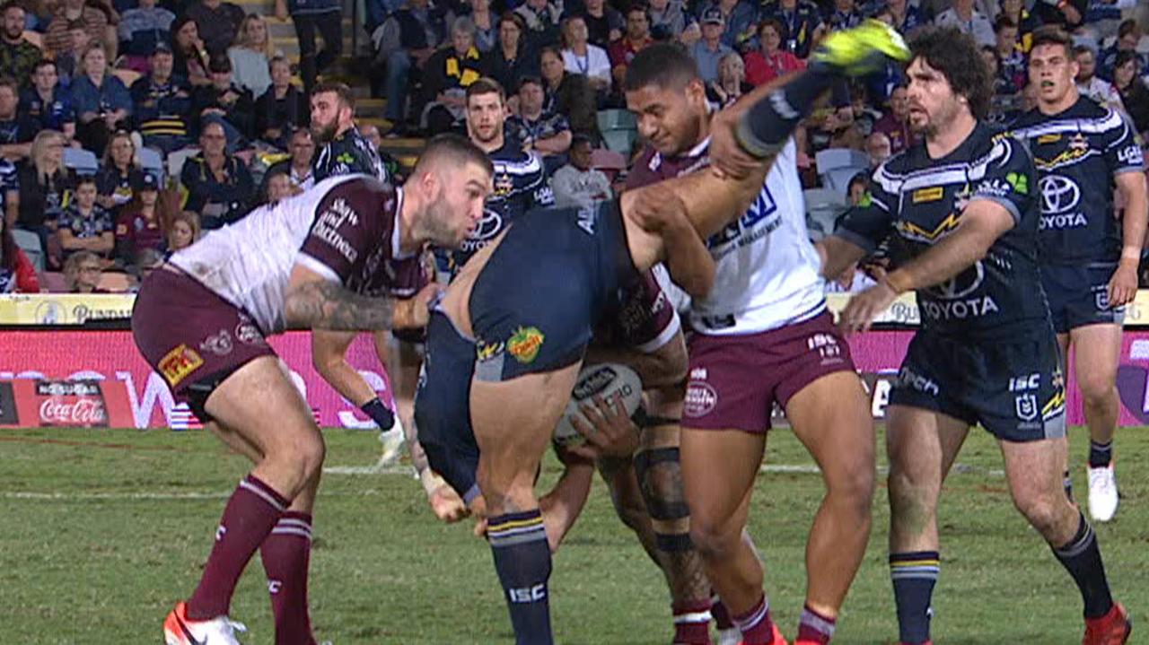 Manase Fainu performs a suspect tackle on Jordan McLean.