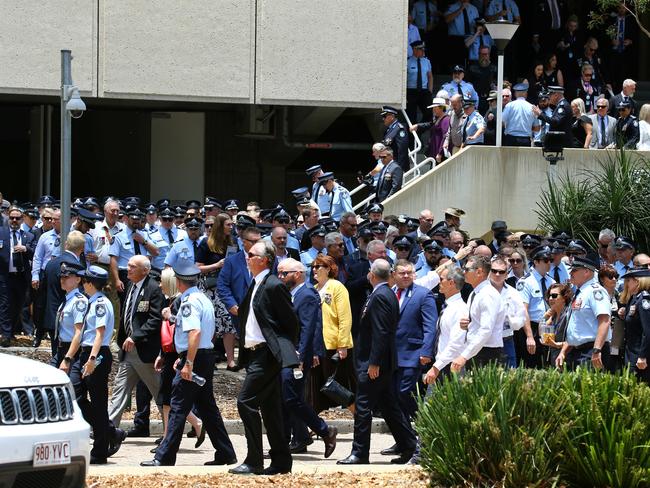 Mourners at the memorial service with full police honours for constables Rachel McCrow and Matthew Arnold at Brisbane Entertainment Centre. Picture: David Clark