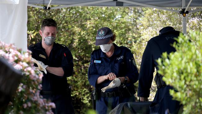 NSW Police from the NSW homicide squad conduct a forensic search at the home of Lynette Joy Dawson's former home at Bayview. Hollie Adams/The Australian