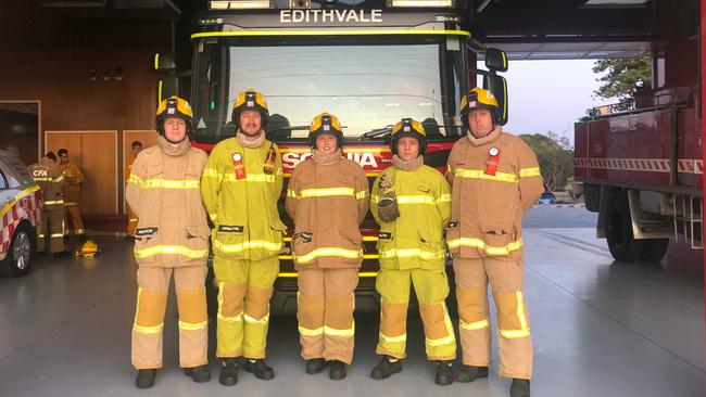 Members at Edithvale's CFA station, Michael, Dan, Chloe, Andy and Mark, try the new Pacific F15 Premium jet-style helmets on for size. Source: Supplied