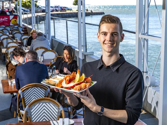 Benjamin Stone poses for a photograph with the 'Taste of the Ocean Platter' at Cleveland Point Lighthouse Restaurant, Monday, August 10, 2020 - Picture: Richard Walker