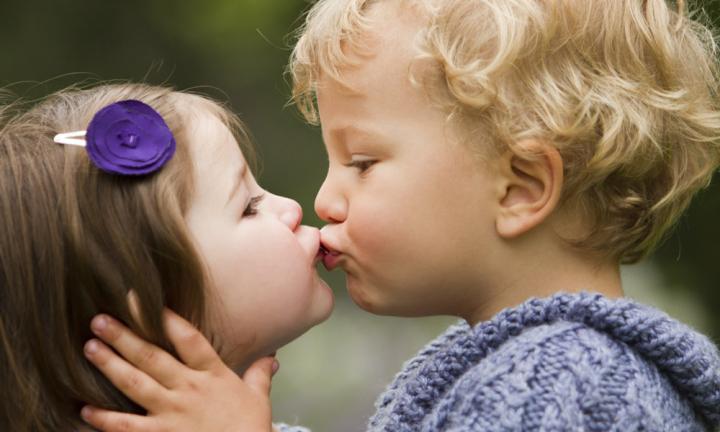 children kissing on the lips