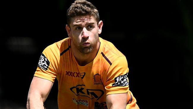 BRISBANE, AUSTRALIA - FEBRUARY 04: Andrew McCullough passes the ball during a Brisbane Broncos NRL training session at the Clive Berghofer Centre on February 04, 2021 in Brisbane, Australia. (Photo by Bradley Kanaris/Getty Images)