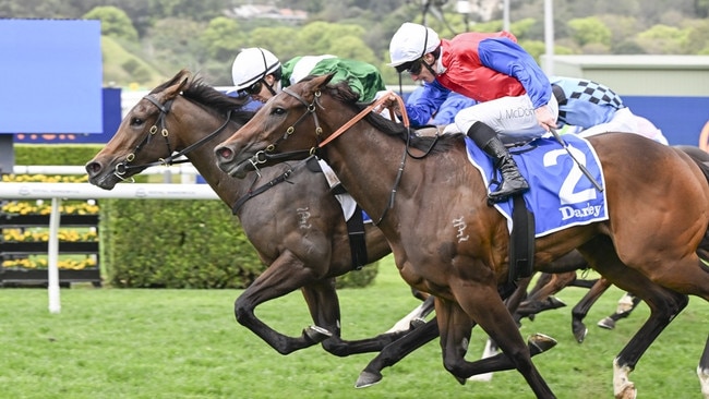 Manaal (green, white cap) holds on to beat Ameena in the Group 2 Furious Stakes at Randwick. Picture: Bradley Photos