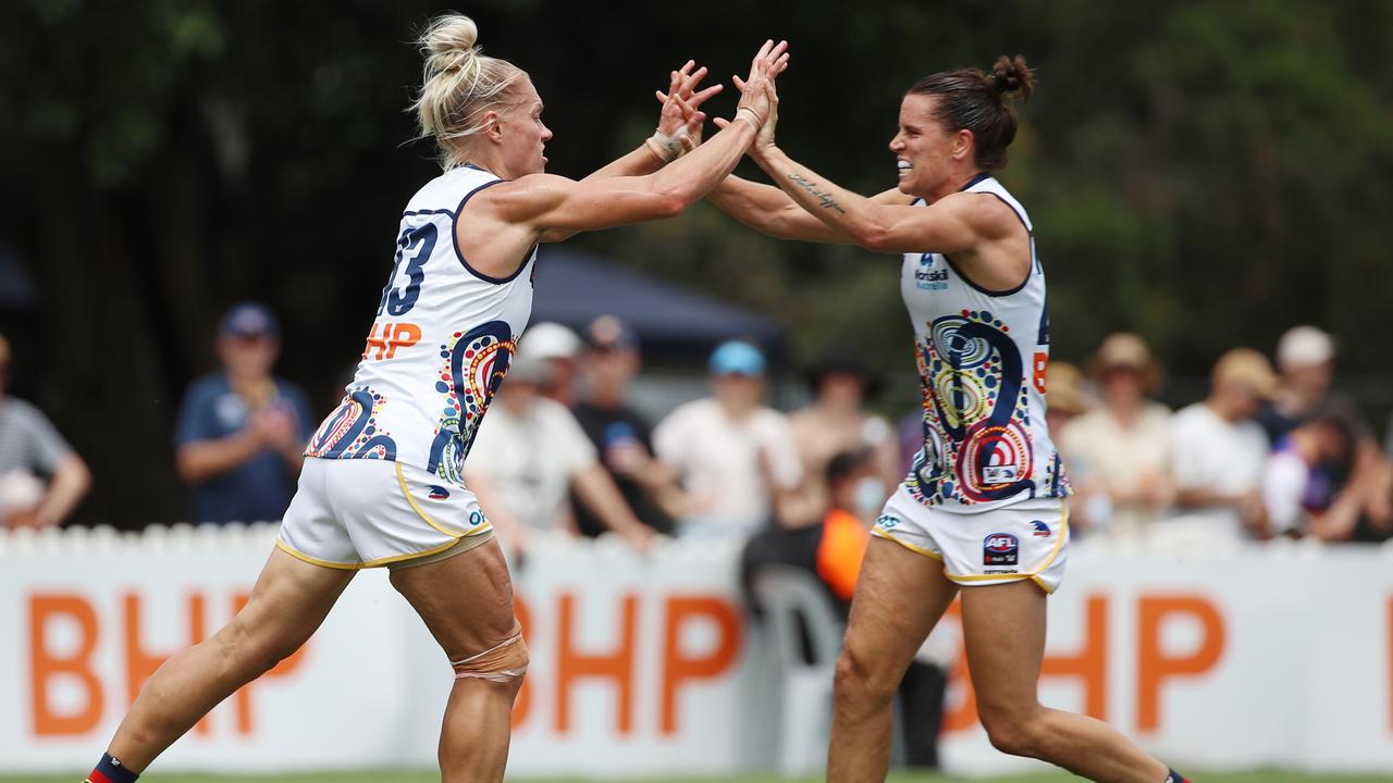 BRISBANE, AUSTRALIA - FEBRUARY 21: Erin Phillips of the Crows celebrates scoring a goal during the round four AFLW match between the Brisbane Lions and the Adelaide Crows at Hickey Park on February 21, 2021 in Brisbane, Australia. (Photo by Glenn Hunt/Getty Images)