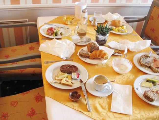 PiMuch food was being thrown away from the buffet. Picture: CEN/australscope