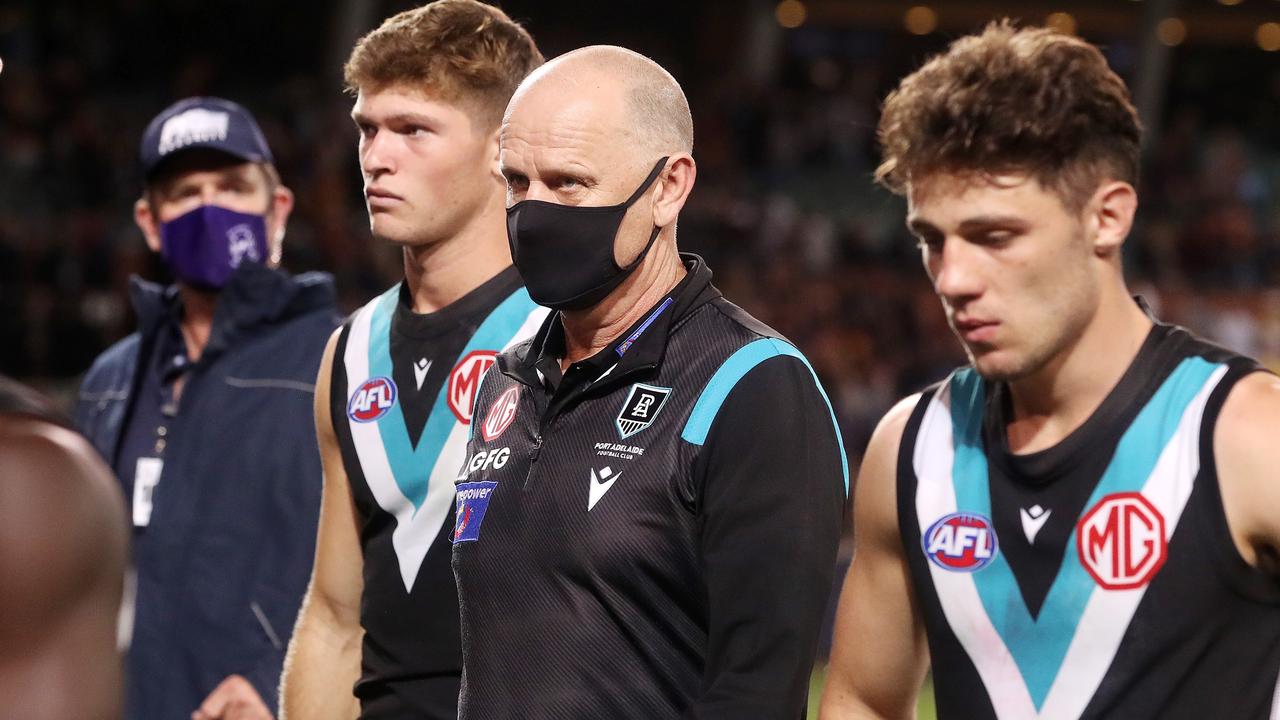Ken Hinkley walks off with his players after the loss to the Adelaide Crows. Picture: Sarah Reed