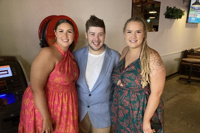 Melbourne cup Canberra left to right Jasmine Jones from Gowrie, Jake Harker from Queanbeyan and Ashton Black from Bonner at hopscotch bar. Picture: Julia Kanapathippillai