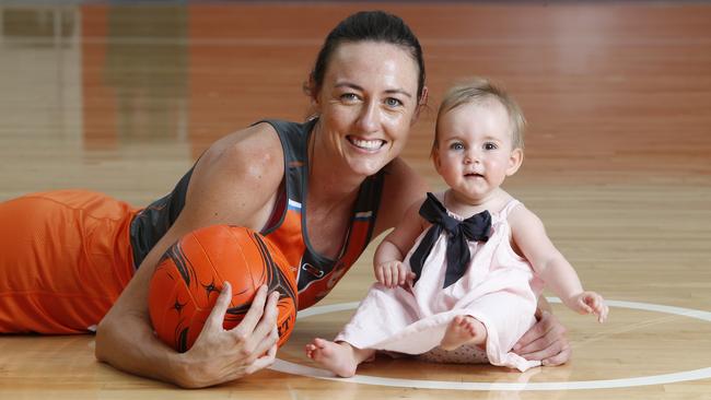 NSW Swift's Netballer Bec Bulley pictured with daughter Indie.