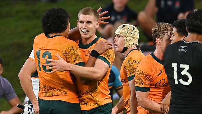 Will McCulloch celebrates with Australian teammates after scoring a try during The Rugby Championship U20 titles which form part of the Junior Wallabies selection Pic: Albert Perez/Getty Images)