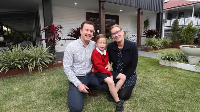 Aaron and Yavanna Grogan and their son Joseph, 6, at the home they are selling in Cannon Hill, which has seen house price growth of 421 per cent in the past 20 years. Picture: Peter Wallis.