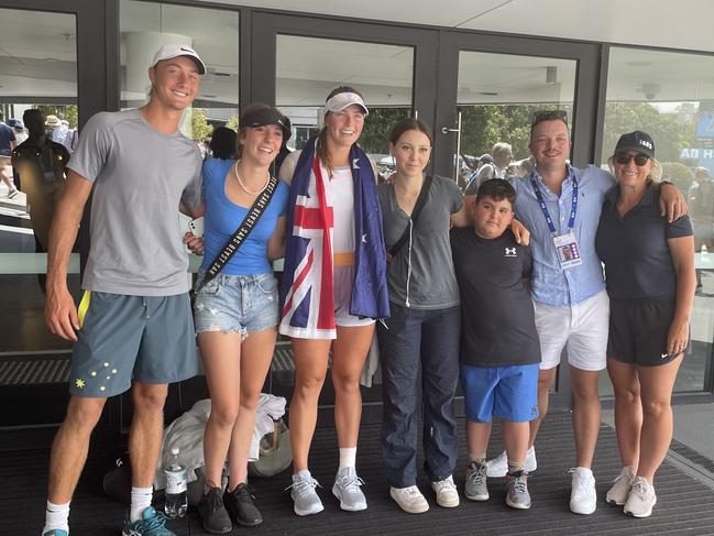 Olivia Gadecki poses with her family after winning her opening round match at the Australian Open.