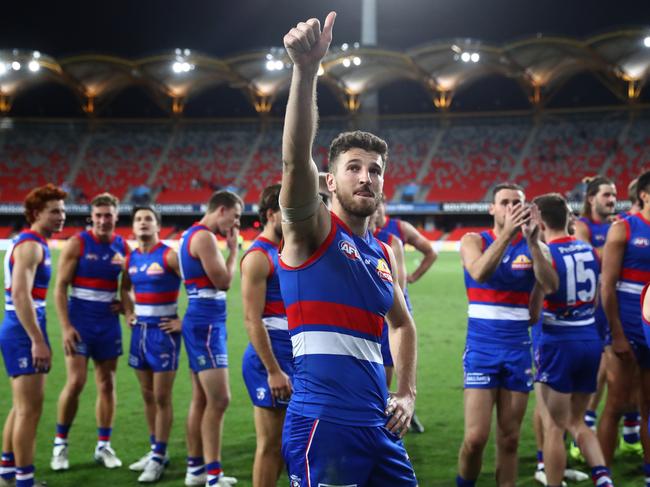 GOLD COAST, AUSTRALIA - JULY 17: Marcus Bontempelli of the Bulldogs waves to the crowd after the Bulldogs defeated the Suns during the round 18 AFL match between Gold Coast Suns and Western Bulldogs at Metricon Stadium on July 17, 2021 in Gold Coast, Australia. (Photo by Chris Hyde/AFL Photos/via Getty Images)