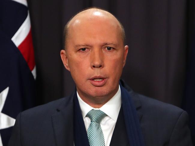 , Home Affairs Minister Peter Dutton holding a press conference at Parliament House in Canberra.