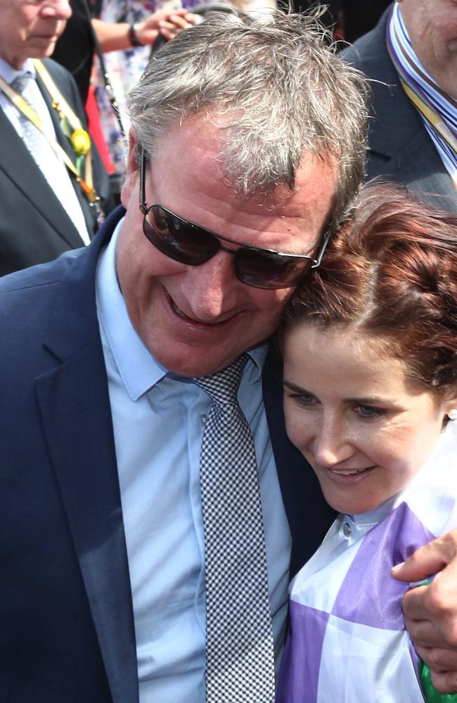 Prince Of Penzance trainer Darren Weir and jockey Michelle Payne celebrate their victory.