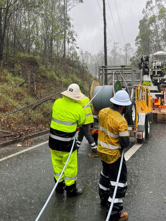 Energex crews working at Oxenford Tamborine Rd on monday January 1, 2024. Picture: Facebook/Energex