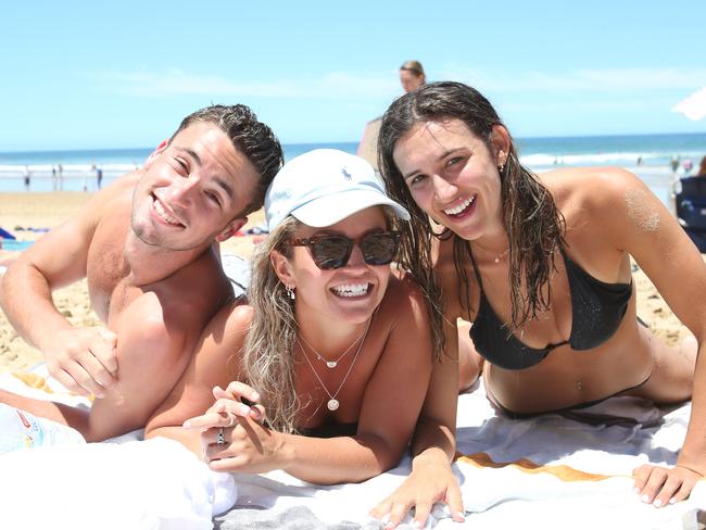 Cam Ralph, Annie Pettist and Tessa Donnithorne. Jan Juc was packed with locals and holidaymakers alike taking advantage of the perfect weather on Sunday. Picture: Alan Barber