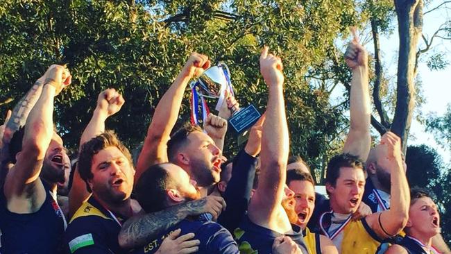 Doveton Eagles celebrate their Division 3 premiership.