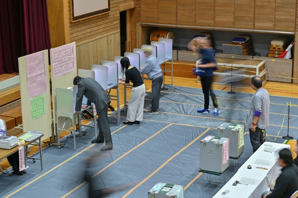 Japan ruling coalition projected to lose majority in election