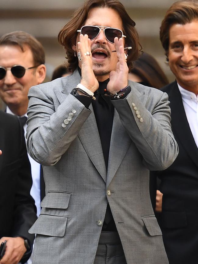 US actor Johnny Depp acknowledges fans. Picture: AFP