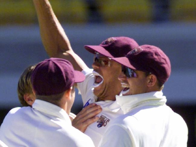 19Dec99. Cricket. Pura Milk Cup at the Gabba, Brisbane. Queensland v Victoria. Queensland's Andrew Symonds pumps his fist in jubilation after taking a sensational catch to dismiss Darren Berry.   f/l/Cricket