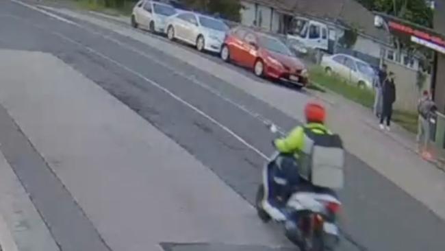 CCTV footage from Wentworthville Railway Station shows the shooter, dressed up as an Uber delivery driver, ride past the gym (top right) in the moments before the shooting. Police allege the shooter is Noah Touma. Touma denies the allegation.