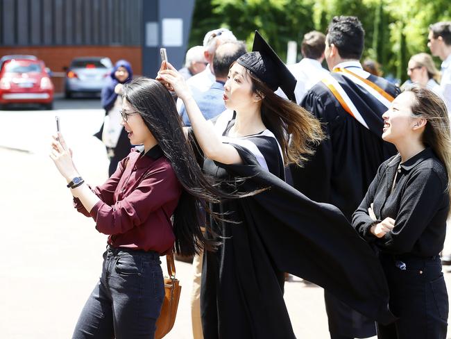 UTAS Graduations - Tasmanian School of Business and Economics and Graduate Research graduates are pictured before the ceremony. Picture: MATT THOMPSON